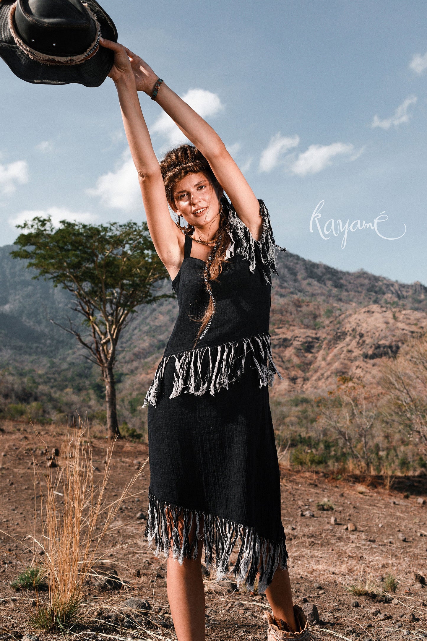 Black dress with tassels