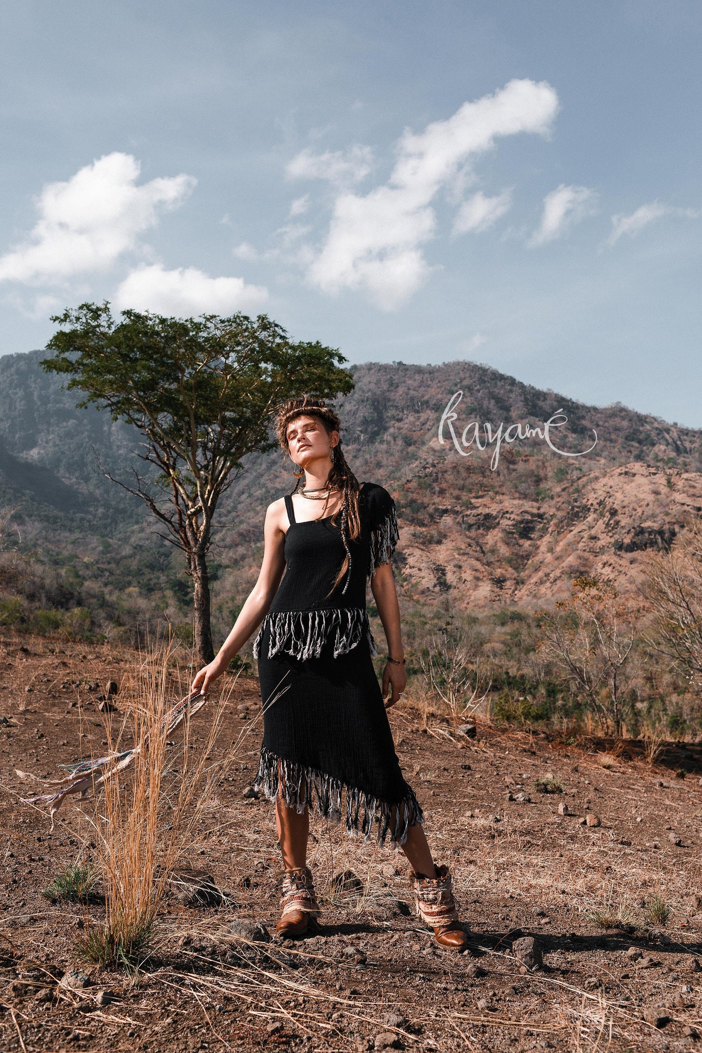 Black dress with tassels