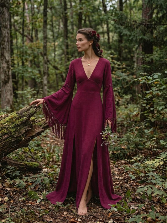 Burgundy goddess maxi dress with deep V neckline, open back and fringe macrame sleeves — handmade in Bali